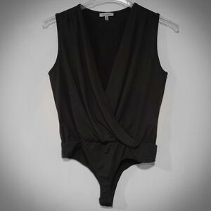 1 piece black sleeveless front wrap body top